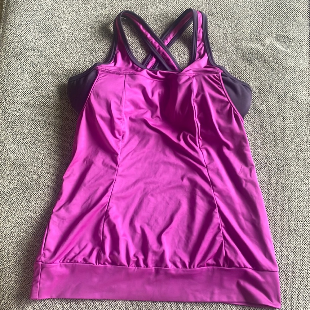 Prana Breathe tank XS. Has built in sports bra and inserts to place pads.